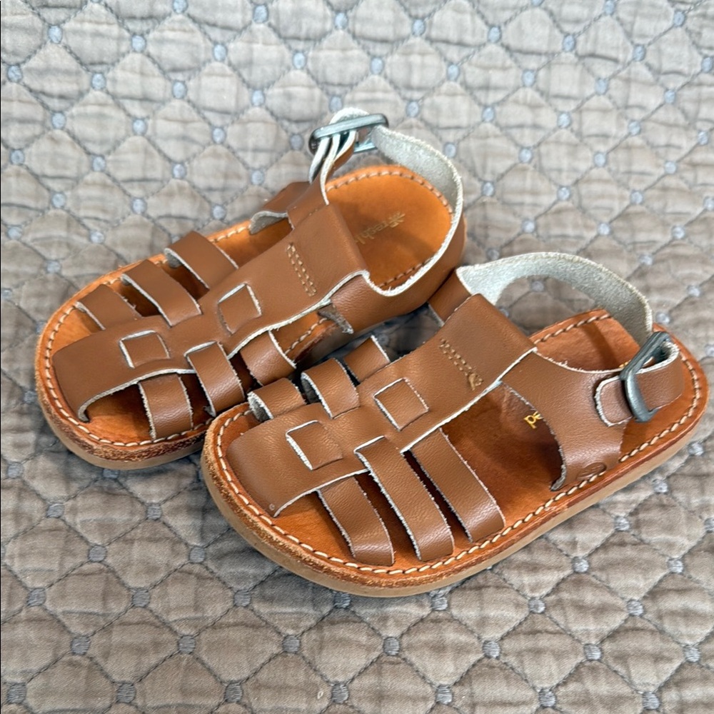 Freshly Picked. Brown Closed-Toe Sandals with Adjustable Strap and Woven Design.